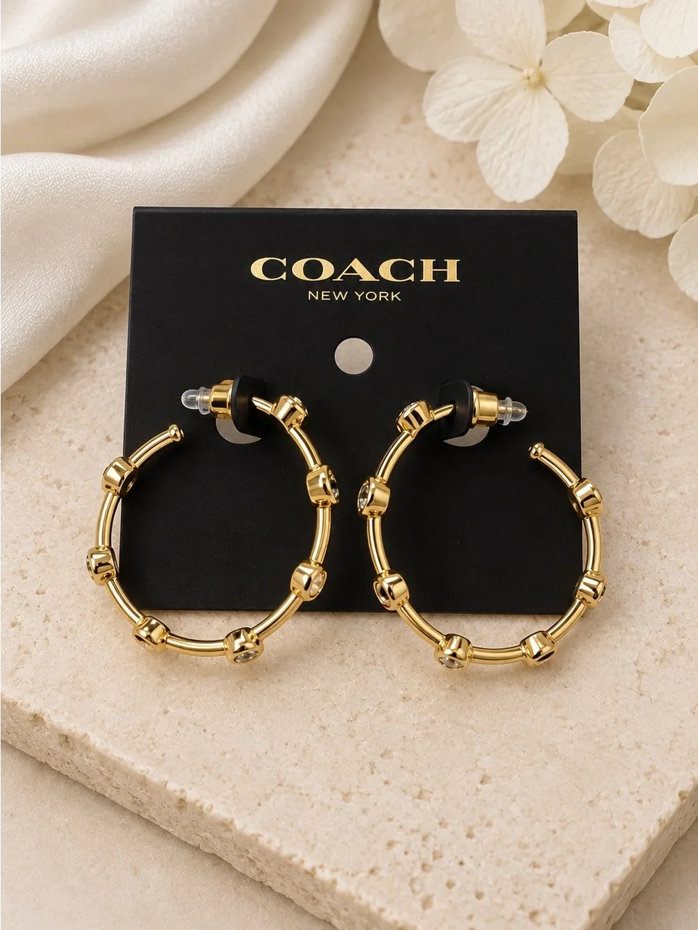 Coach Gold Tone Crystal Accent Hoop Earrings